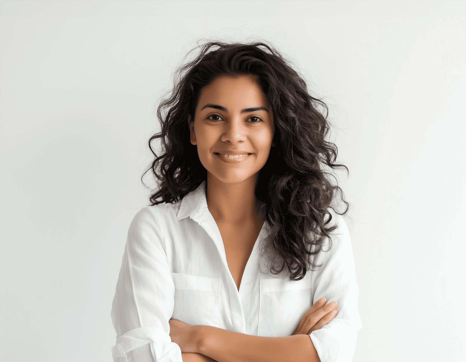 Portrait of Sofia Marín smiling with her arms crossed